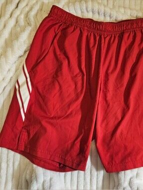 Nike Red Boys Athletic Shorts with White Stripes